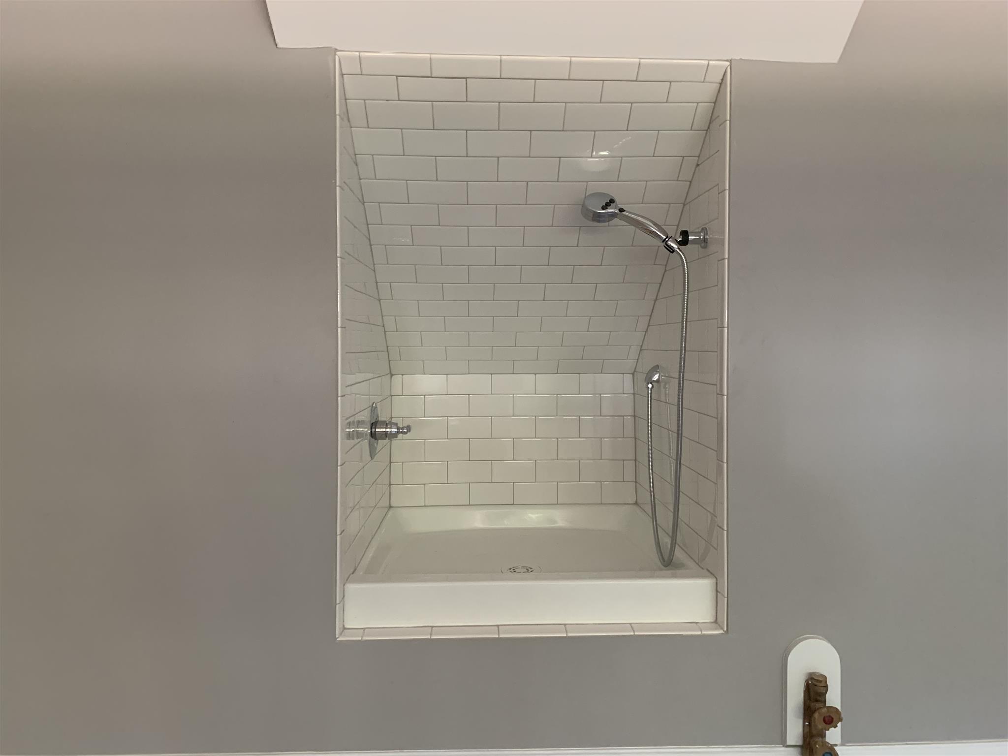 9993 McKee Road Lascassas, TN 37085 - Photo 27 of 30 Pet bath inside of garage with hot/cold faucet. Insulated garage.
