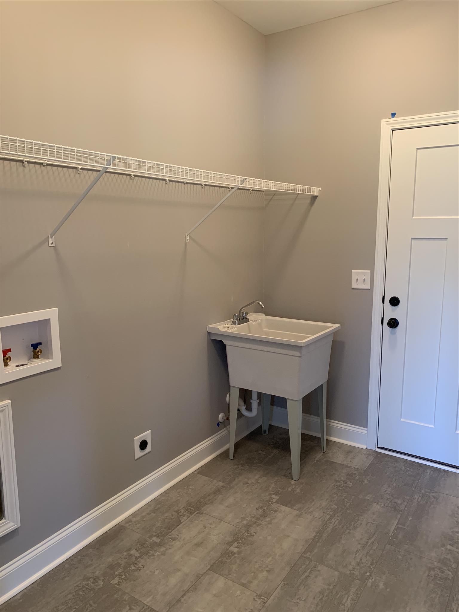 9993 McKee Road Lascassas, TN 37085 - Photo 29 of 30 Laundry room with sink.