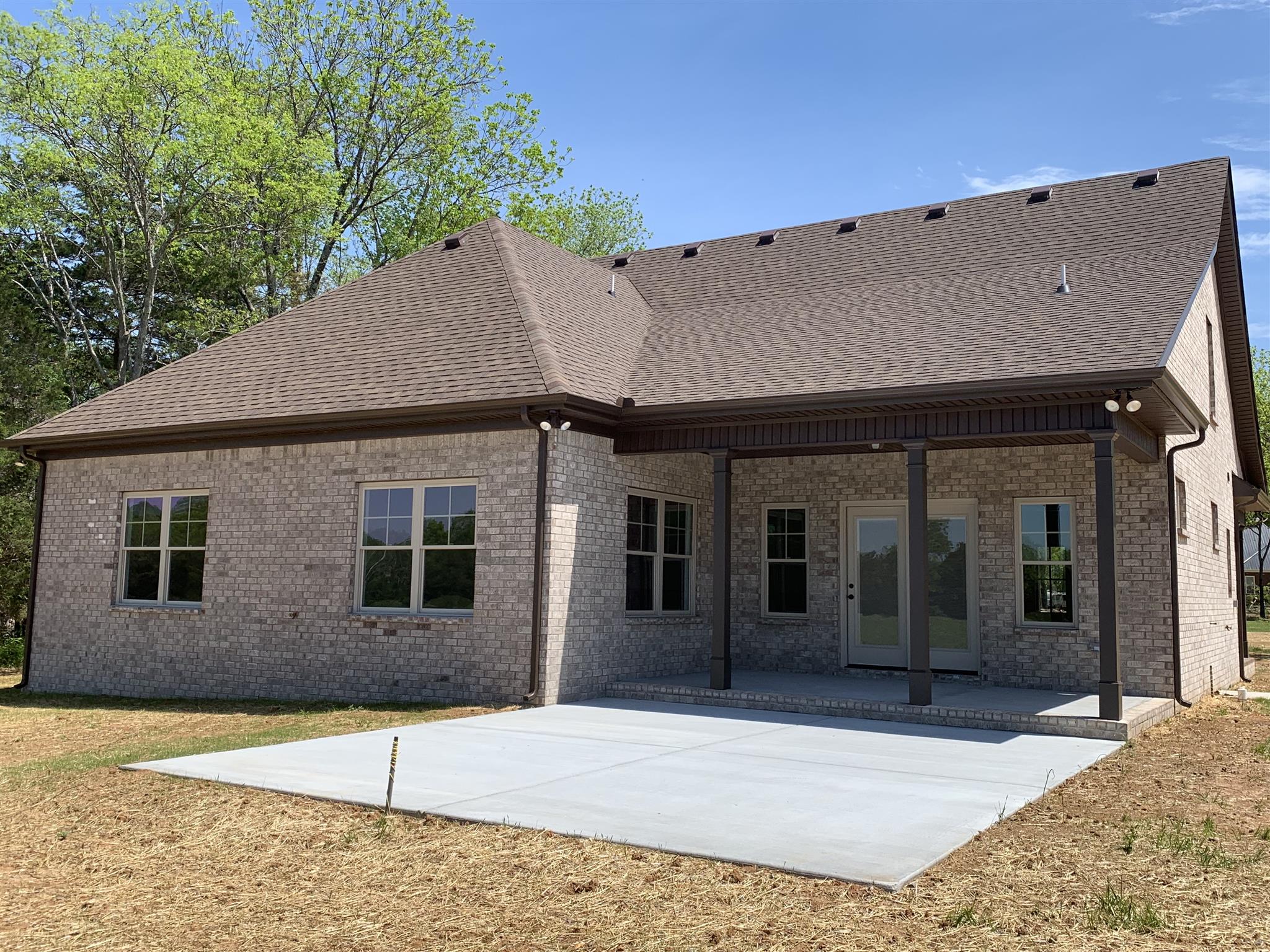 9993 McKee Road Lascassas, TN 37085 - Photo 3 of 30 Nice size covered patio with extra concrete pad for entertaining.