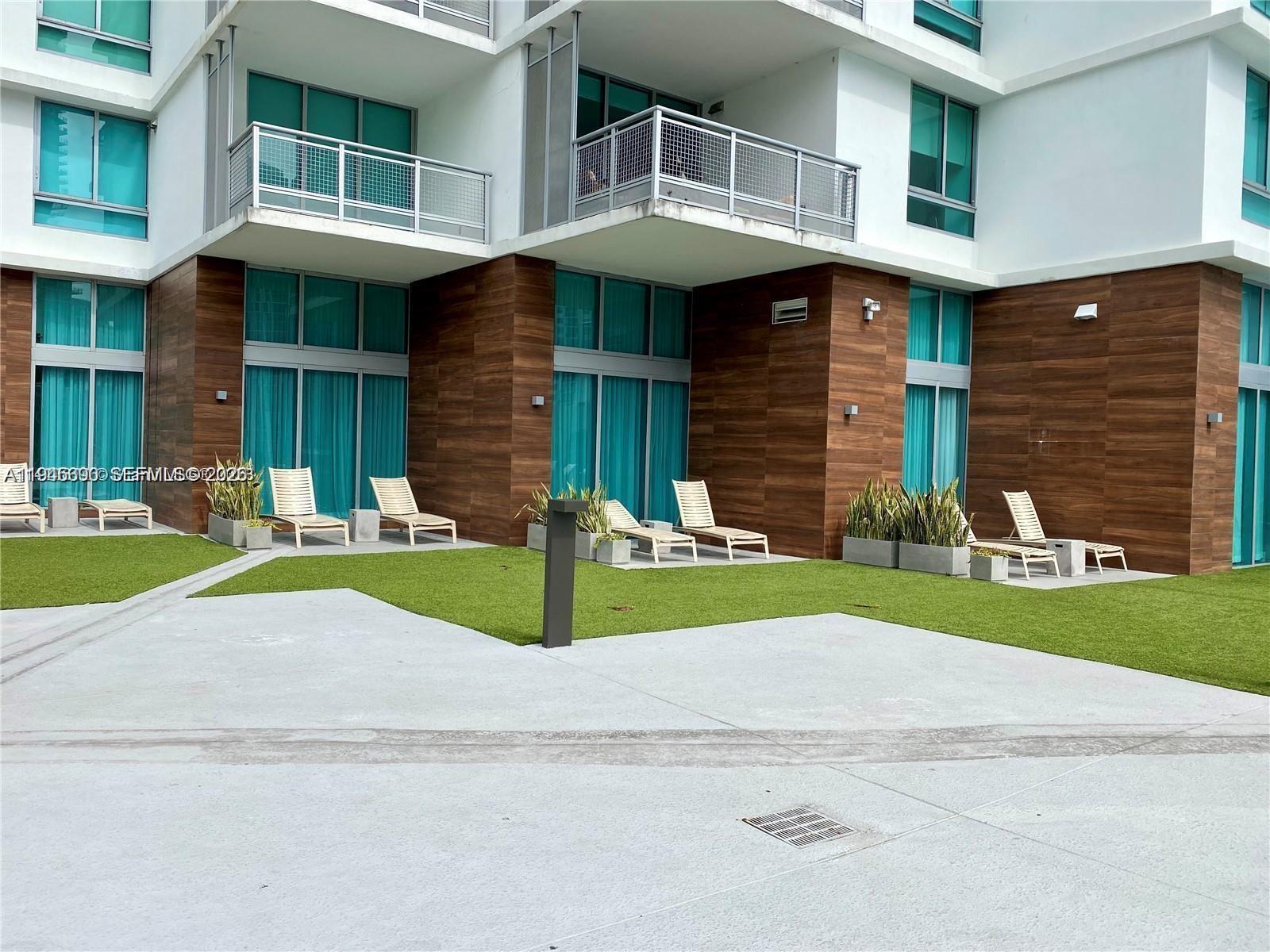350 South Miami Avenue, Unit 1905 Miami, FL 33130 - Photo 26 of 26 a view of outdoor space yard and front view of a house