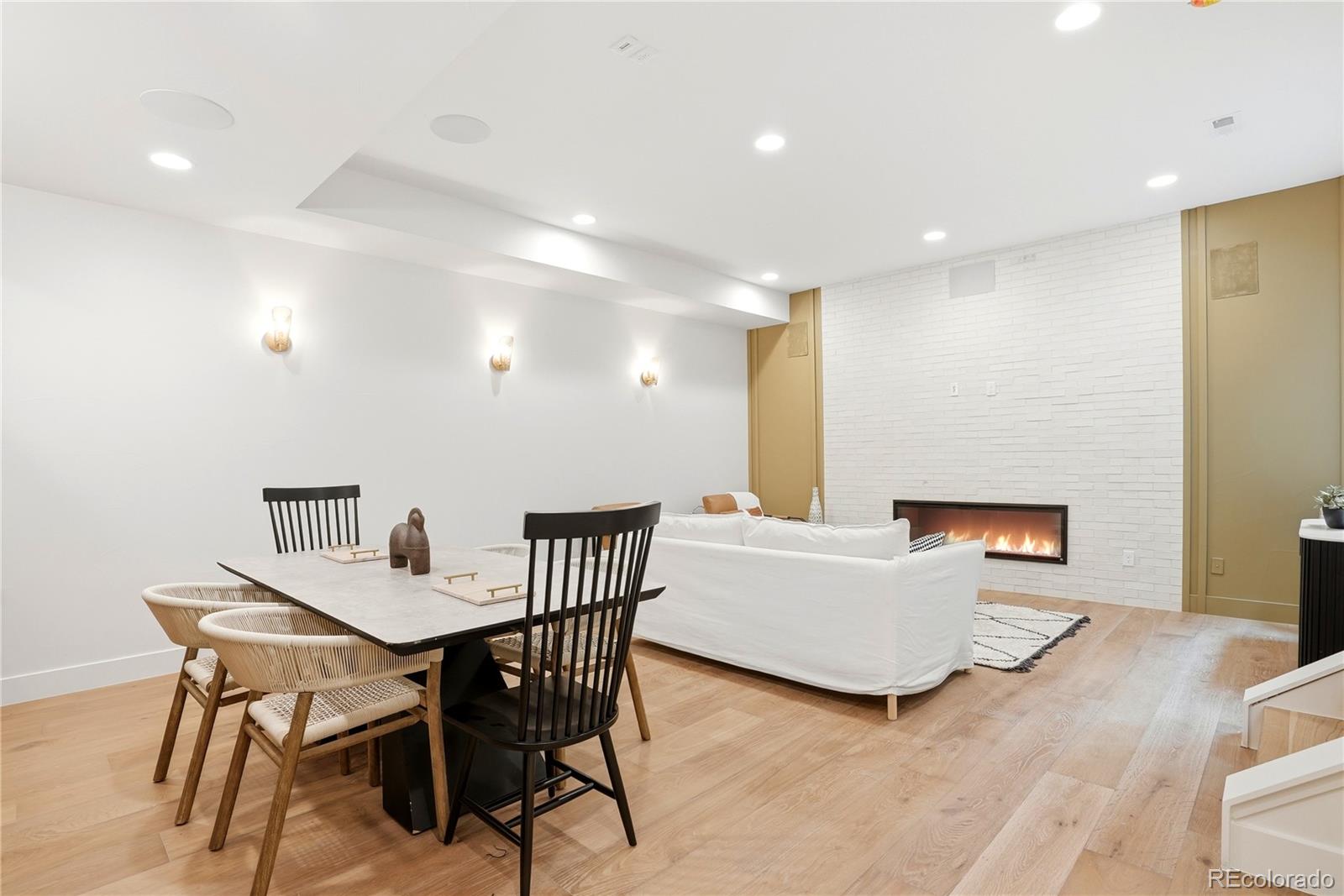 245 South Emerson Street Denver, CO 80209 - Photo 19 of 49 a living room with furniture and a wooden floor