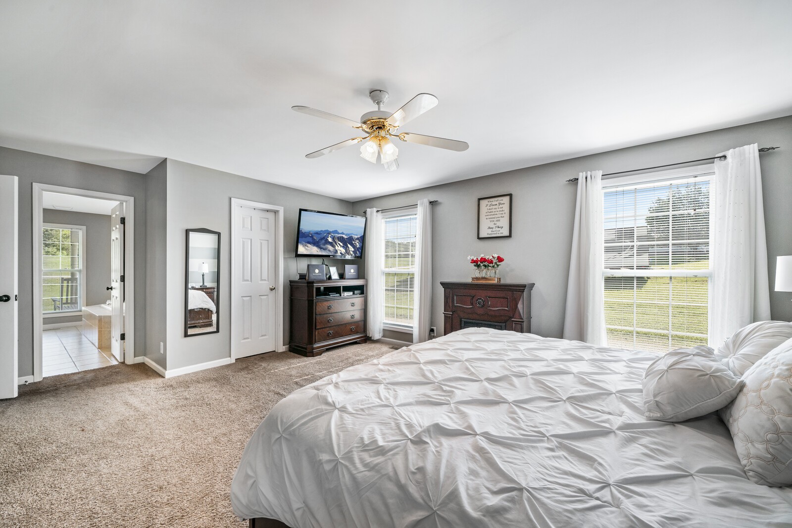 3234 Bennett Road Cookeville, TN 38506 - Photo 14 of 45 a bedroom with a large bed and a window
