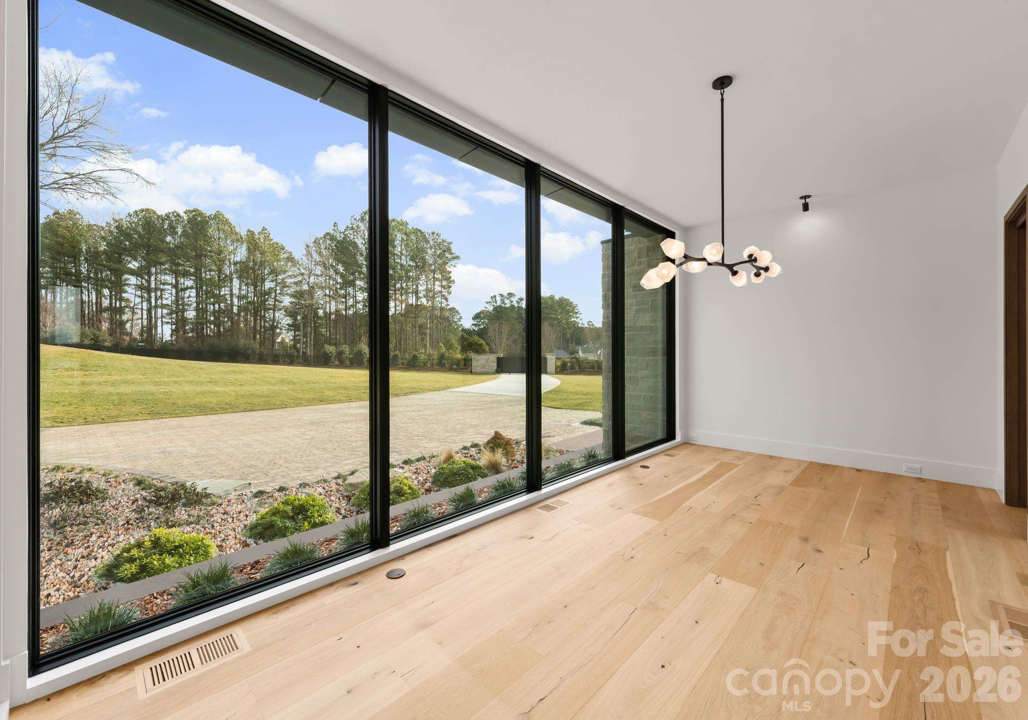 2536 Brawley School Road Mooresville, NC 28117 - Photo 18 of 48 a view of a room with a large window