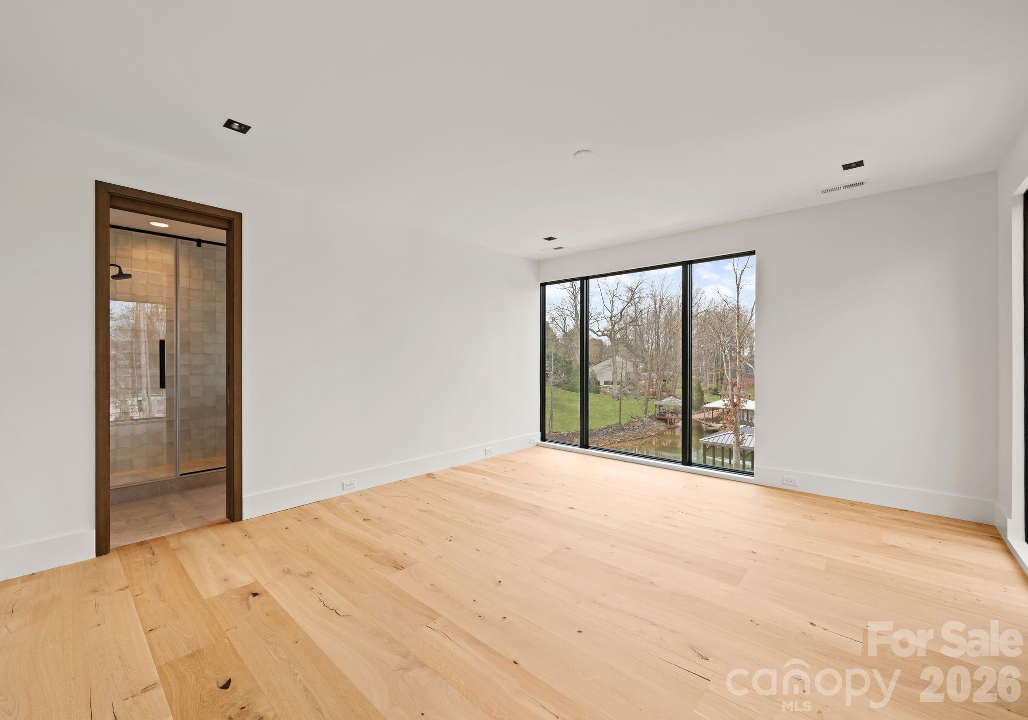 2536 Brawley School Road Mooresville, NC 28117 - Photo 32 of 48 a view of an empty room with a window