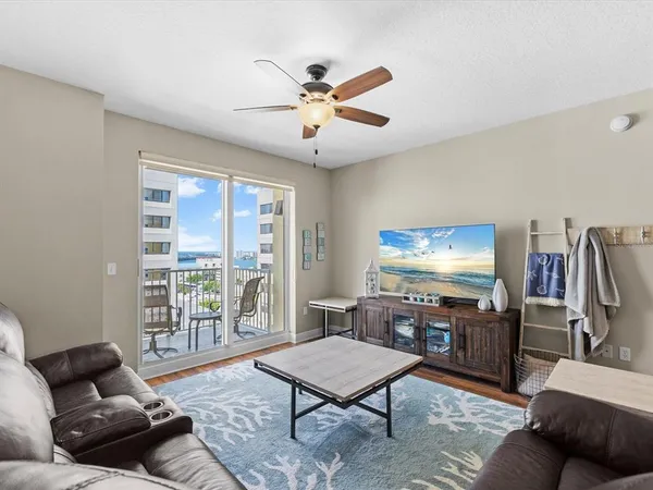 a living room with furniture and a window