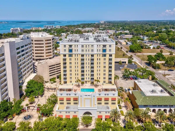 a view of a building with a city street