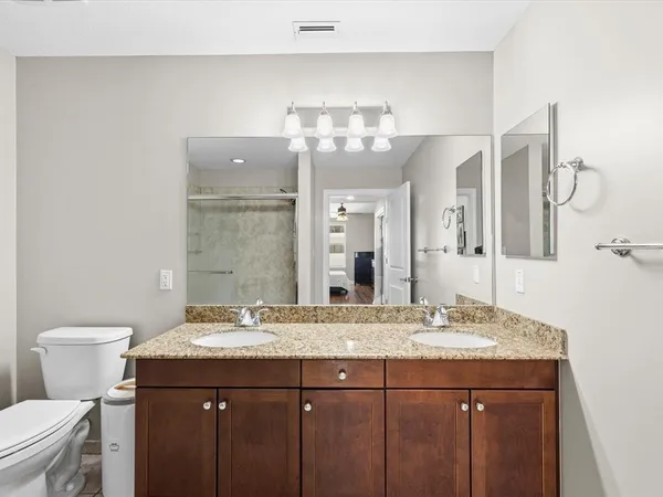 a view of a building with a street