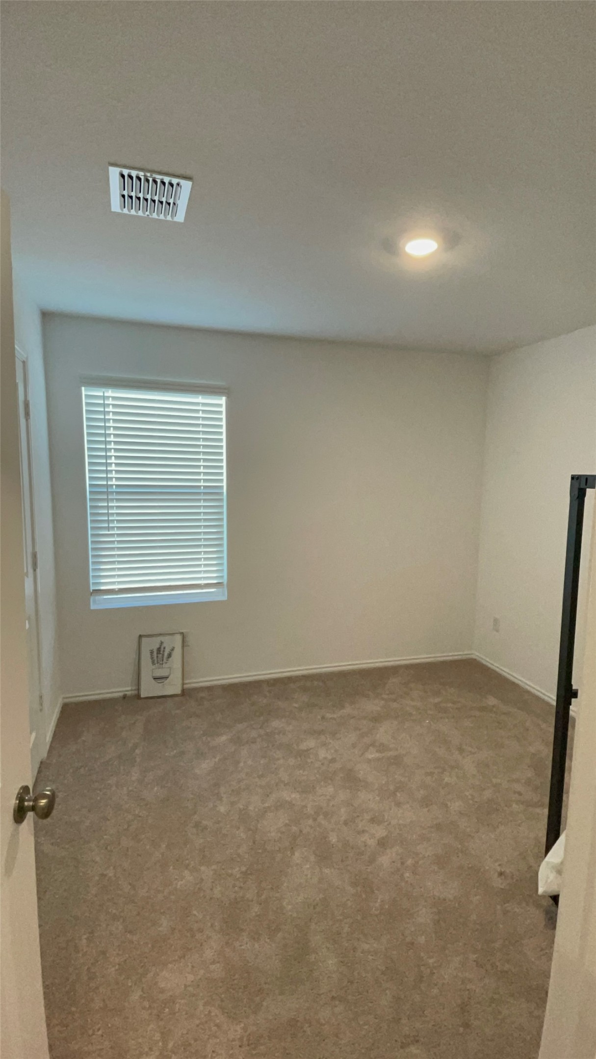 212 Marty Allen Loop Jarrell, TX 76537 - Photo 3 of 13 Carpeted room featuring a single window with horizontal blinds, recessed lighting, and a ceiling-mounted air vent
