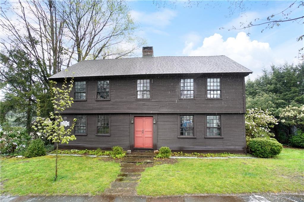239 Main Street Durham, CT 06422 - Photo 1 of 1 a front view of a house with a yard