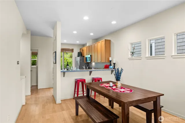 a very nice looking dining room with a table and chairs