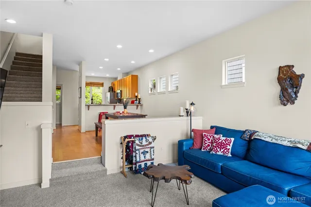 a living room with furniture and a table
