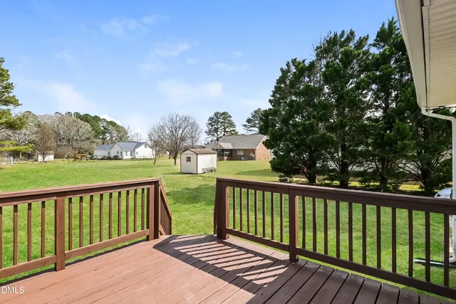 a view of a wooden roof deck