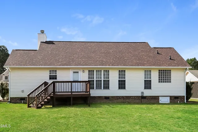 a house view with a garden space