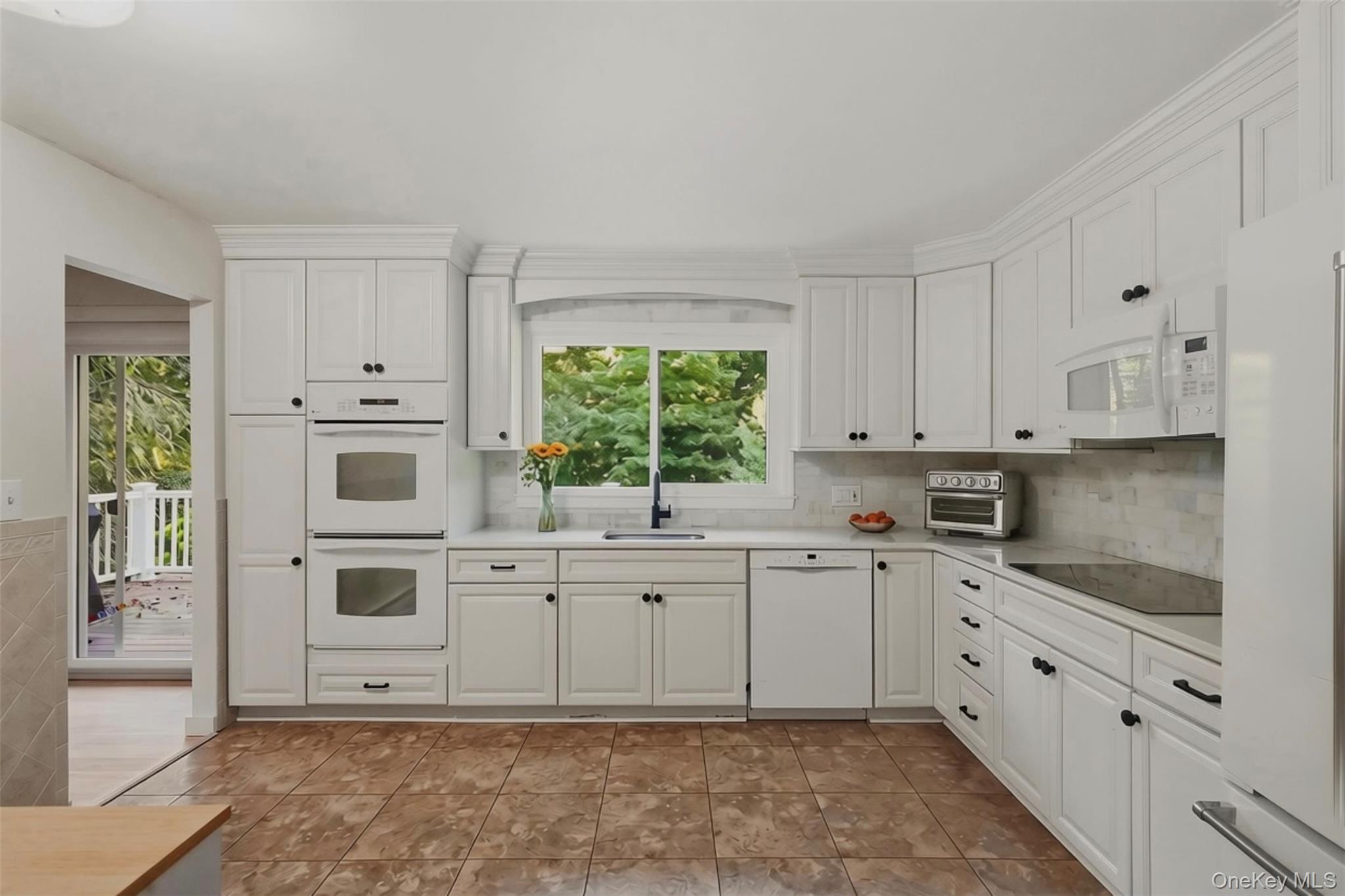 136 Hustis Road Cold Spring, NY 10516 - Photo 6 of 21 Kitchen with access to sliding doors to porch