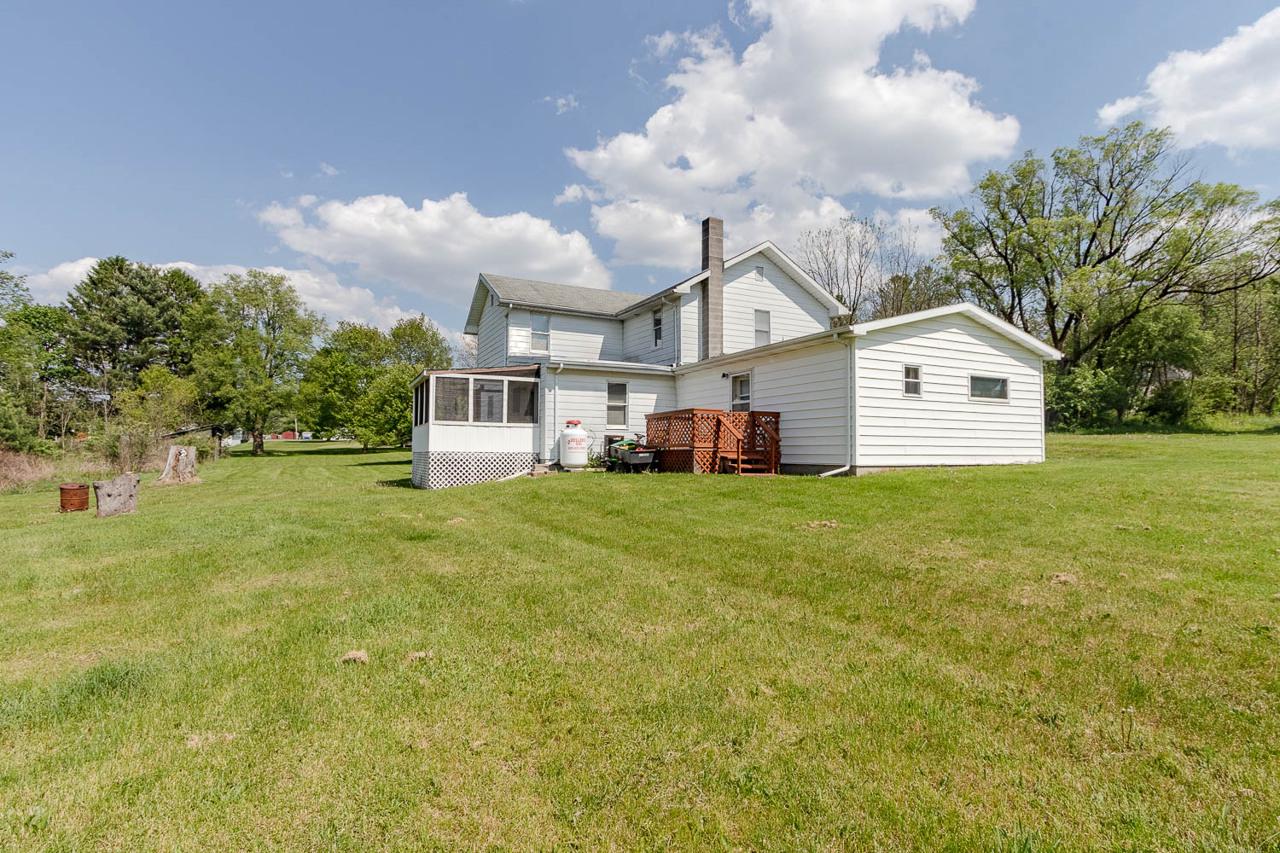 203 Gorton Road Moshannon, PA 16859 - Photo 38 of 39 a front view of a house with a garden and yard