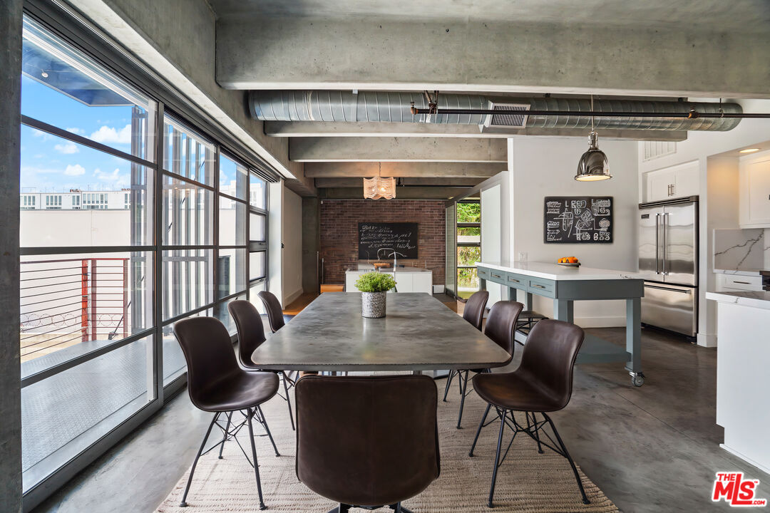 4141 Glencoe Avenue, Unit 211 Marina del Rey, CA 90292 - Photo 28 of 49 a view of a dining room with furniture window and outside view