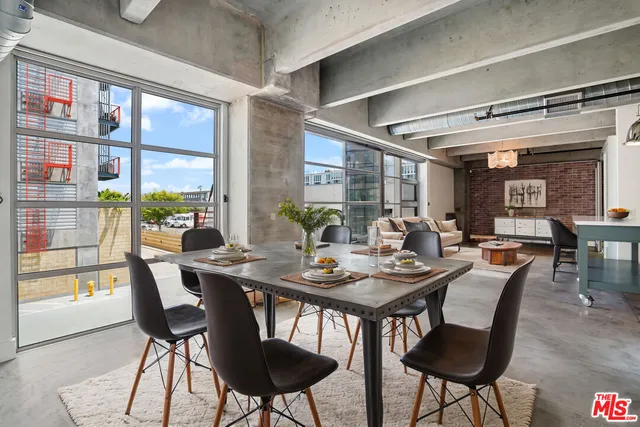 a large white bed in a small room