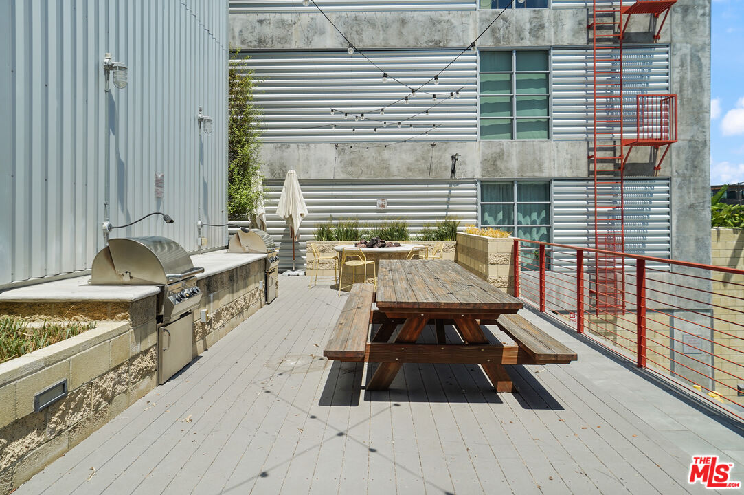 4141 Glencoe Avenue, Unit 211 Marina del Rey, CA 90292 - Photo 33 of 49 a view of barbeque area with seating area