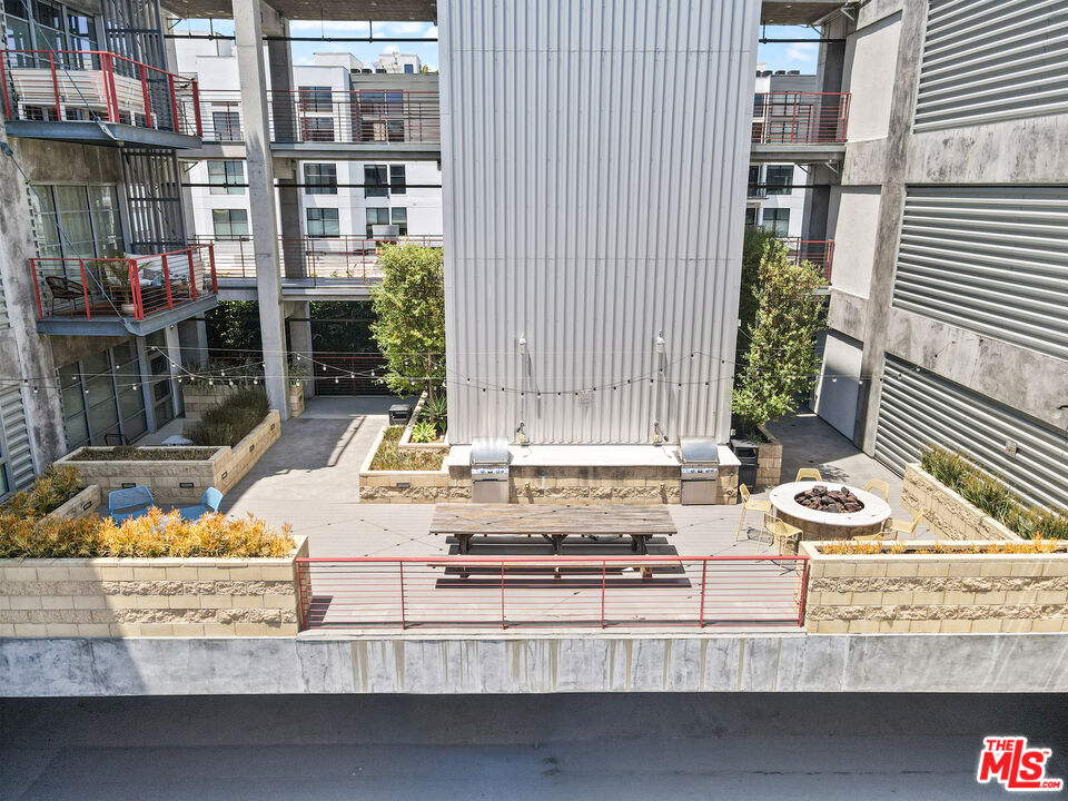 4141 Glencoe Avenue, Unit 211 Marina del Rey, CA 90292 - Photo 38 of 49 a view of a house with a large window and wooden floor