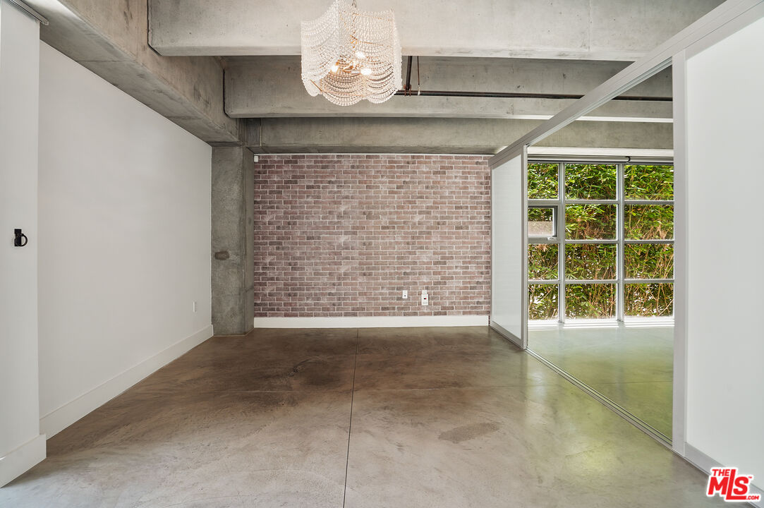 4141 Glencoe Avenue, Unit 211 Marina del Rey, CA 90292 - Photo 9 of 49 a view of an empty room with a window