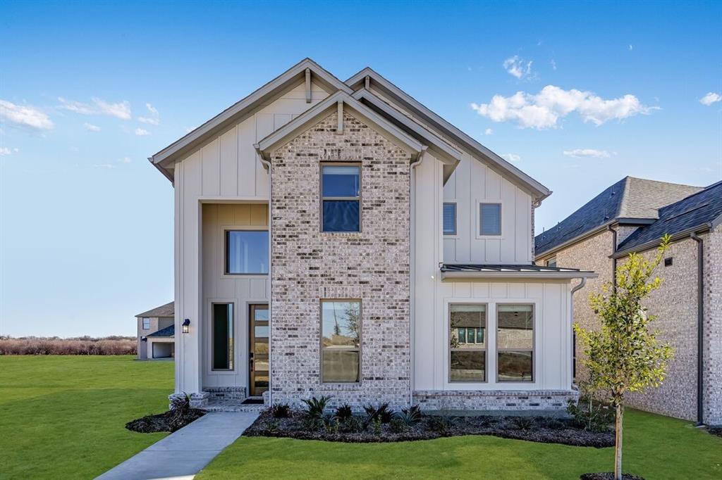 1017 Fallow Lane Celina, TX 75009 - Photo 1 of 1 a front view of a house with a yard