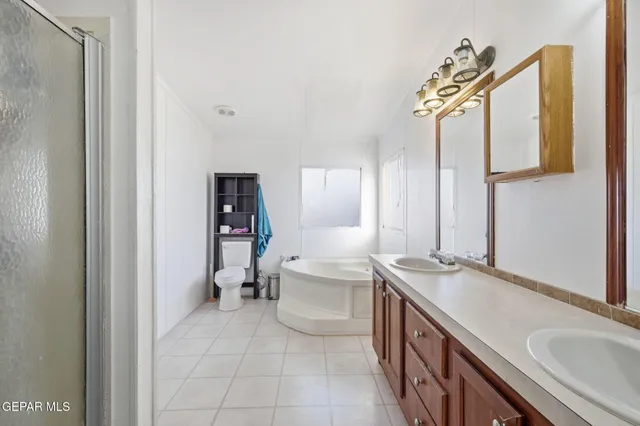 a bedroom with a bed and a table in it