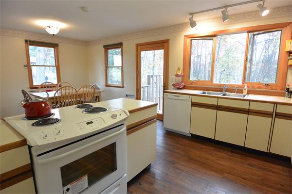400 South Meadow Road Lancaster, MA 01523 - Photo 4 of 20 a kitchen with a sink and windows