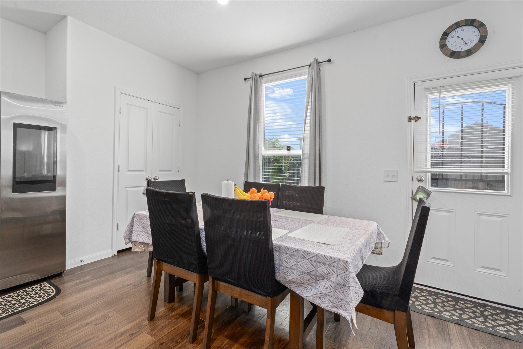 5826 Finely Run St Spring Spring, TX 77373 - Photo 16 of 38 a view of a dining room with furniture window and wooden floor