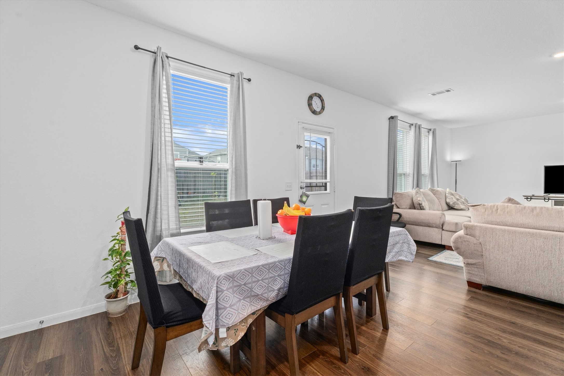 5826 Finely Run St Spring Spring, TX 77373 - Photo 18 of 38 a living room with furniture a wooden floor and a window