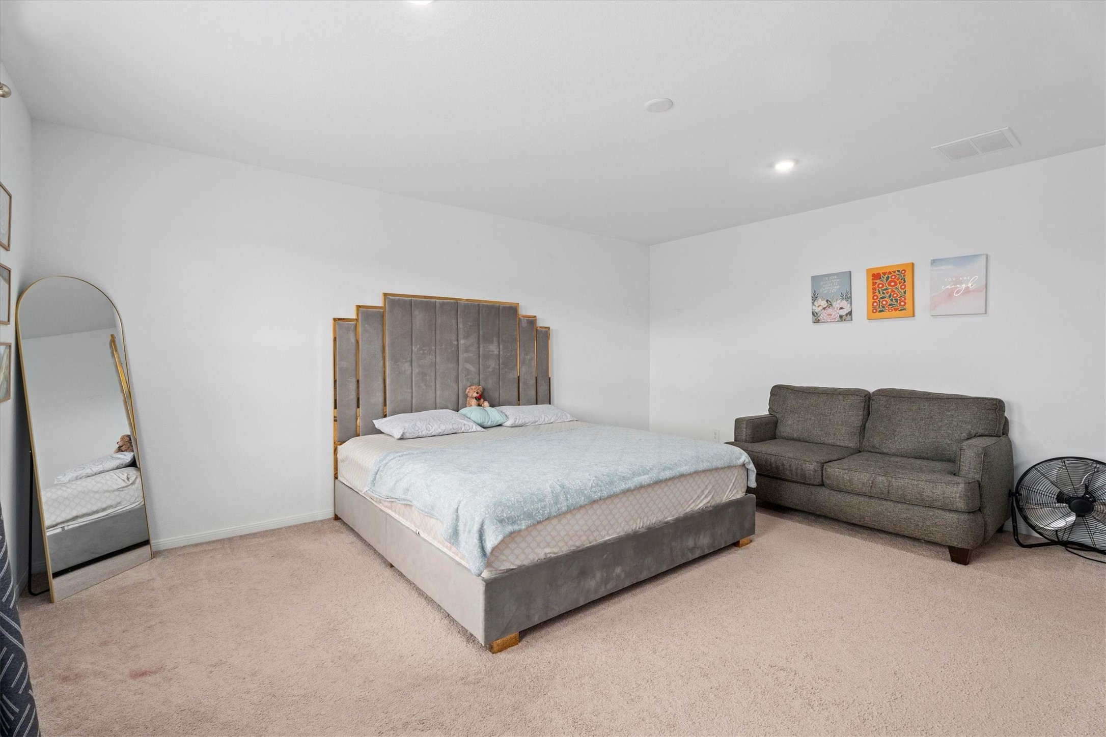 5826 Finely Run St Spring Spring, TX 77373 - Photo 27 of 38 a spacious bedroom with a bed and a couch