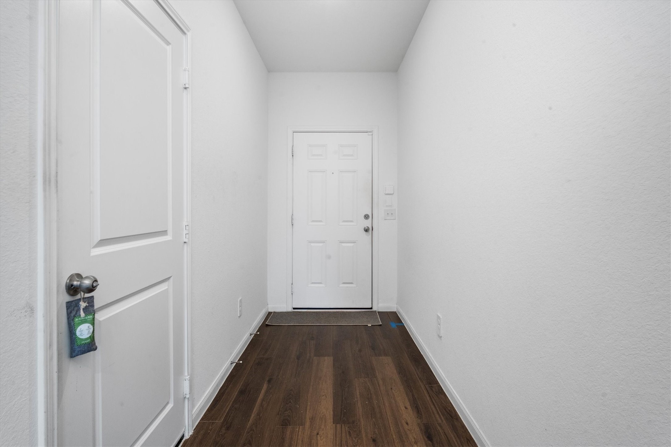 5826 Finely Run St Spring Spring, TX 77373 - Photo 5 of 38 a view of a hallway with wooden floor