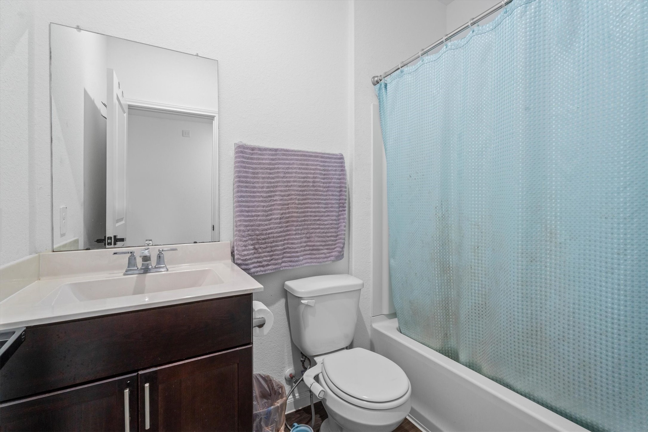 5826 Finely Run St Spring Spring, TX 77373 - Photo 8 of 38 a bathroom with a sink a toilet a mirror and shower