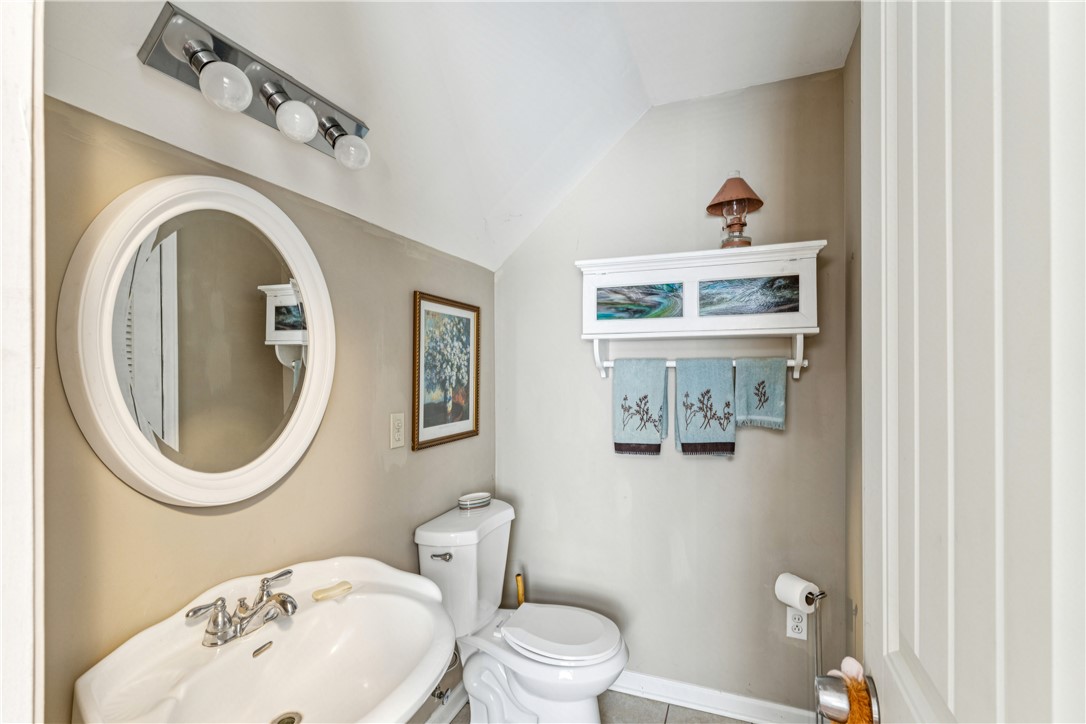 189 Little Choestoea Road Westminster, SC 29693 - Photo 26 of 38 This bathroom features a sleek sink and a classic toilet, offering functionality and simple design.