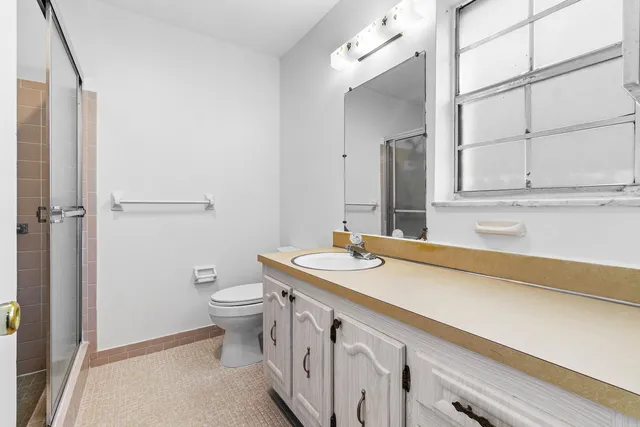 a bathroom with a sink and a toilet