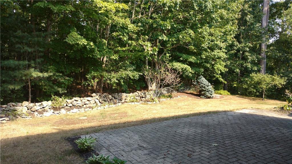 18 Yorke Ridge Way, Unit 18 York, ME 03909 - Photo 12 of 26 Private back yard with large patio.