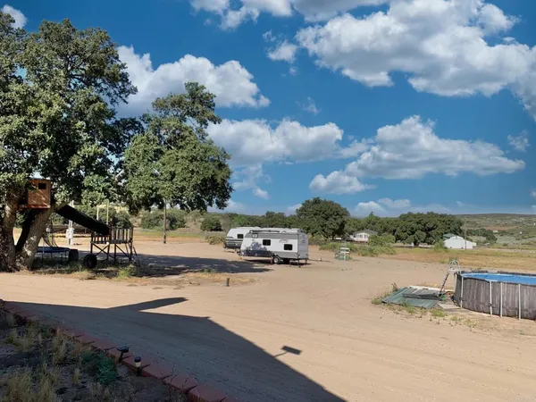 a view of a sink and wooden floor