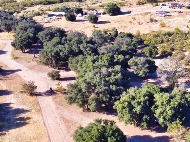 a front view of a house with a wooden fence