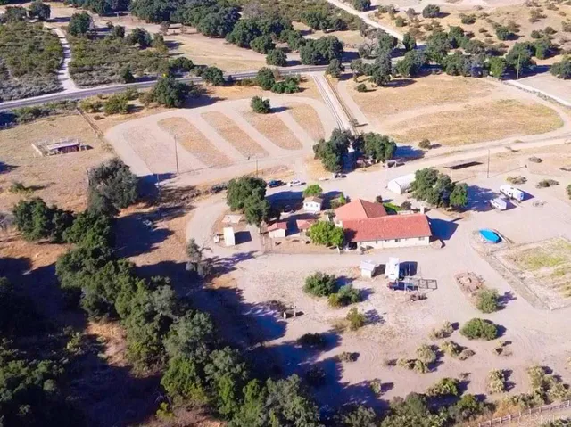a view of a wooden door of the house