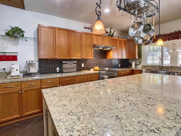 a bathroom with a toilet a sink and a mirror
