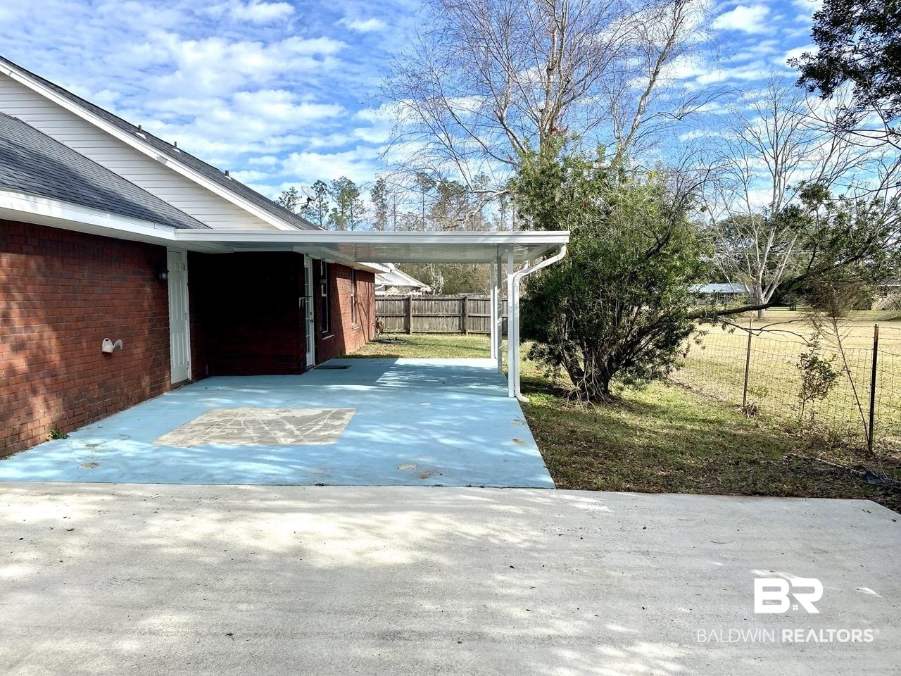 16420 Absalom Street Foley, AL 36535 - Photo 14 of 18 Exterior space featuring a carport