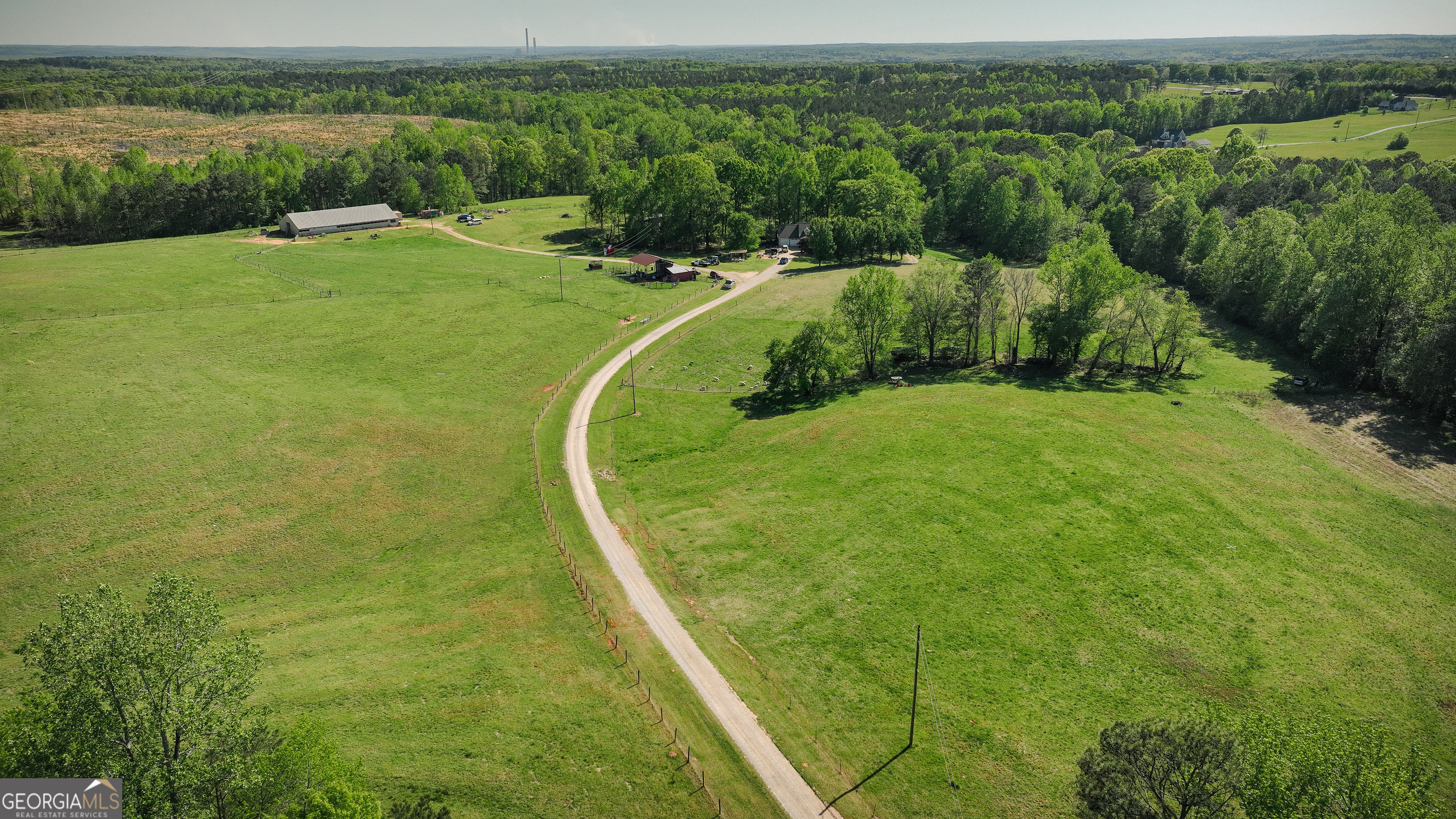 201 Little New York Road Carrollton, GA 30116 - Photo 16 of 29 a view of a lake with a yard