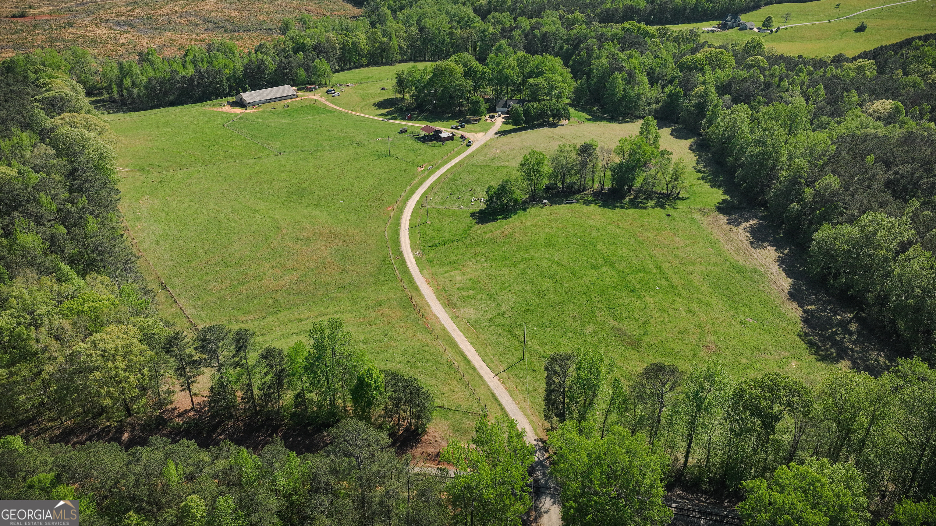201 Little New York Road Carrollton, GA 30116 - Photo 17 of 29 an aerial view of a residential houses with outdoor space and trees all around
