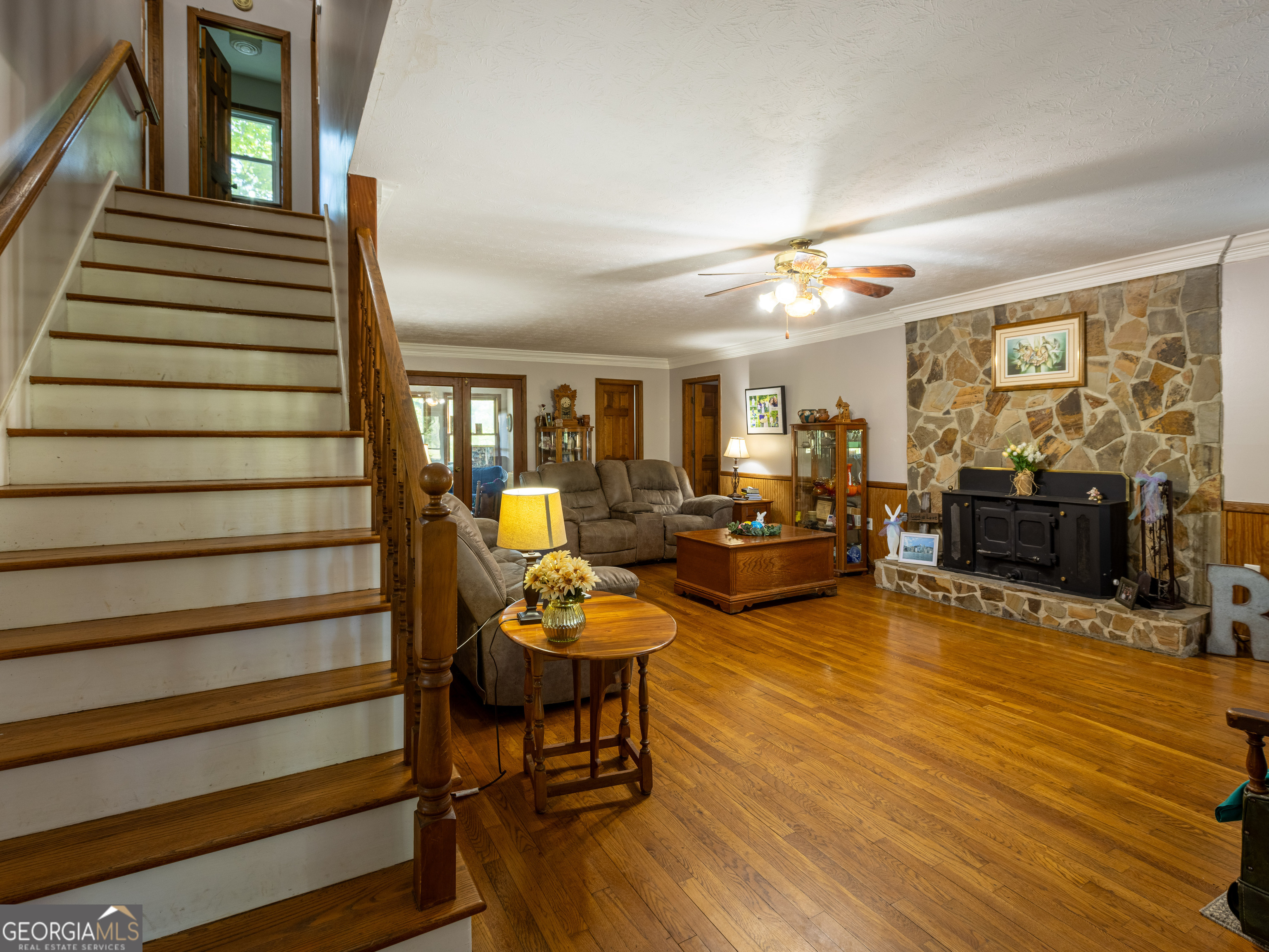 201 Little New York Road Carrollton, GA 30116 - Photo 24 of 29 a living room with furniture and a fireplace