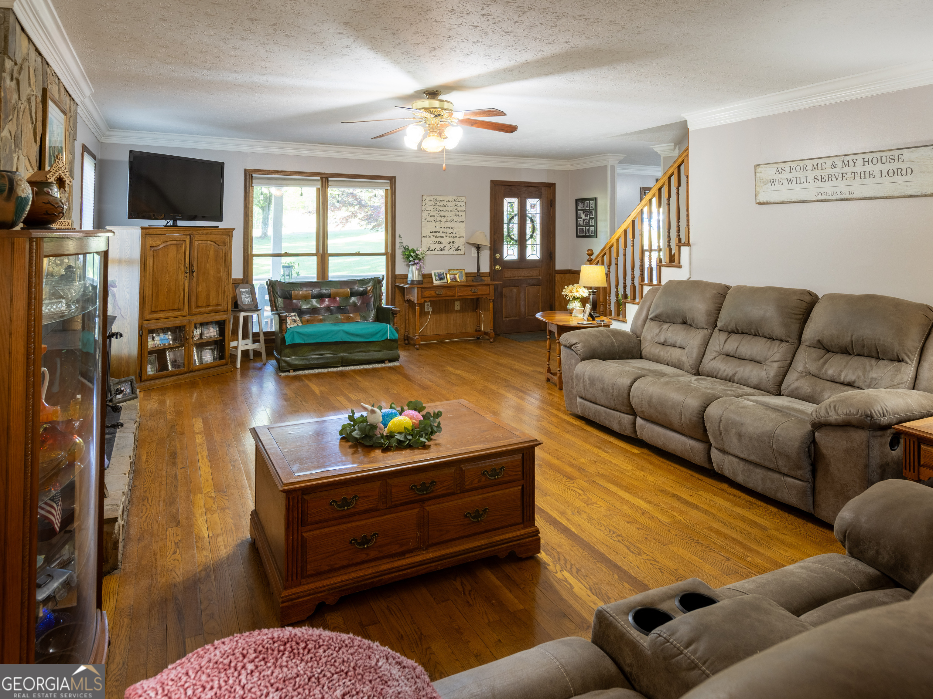 201 Little New York Road Carrollton, GA 30116 - Photo 27 of 29 a living room with furniture and a couch