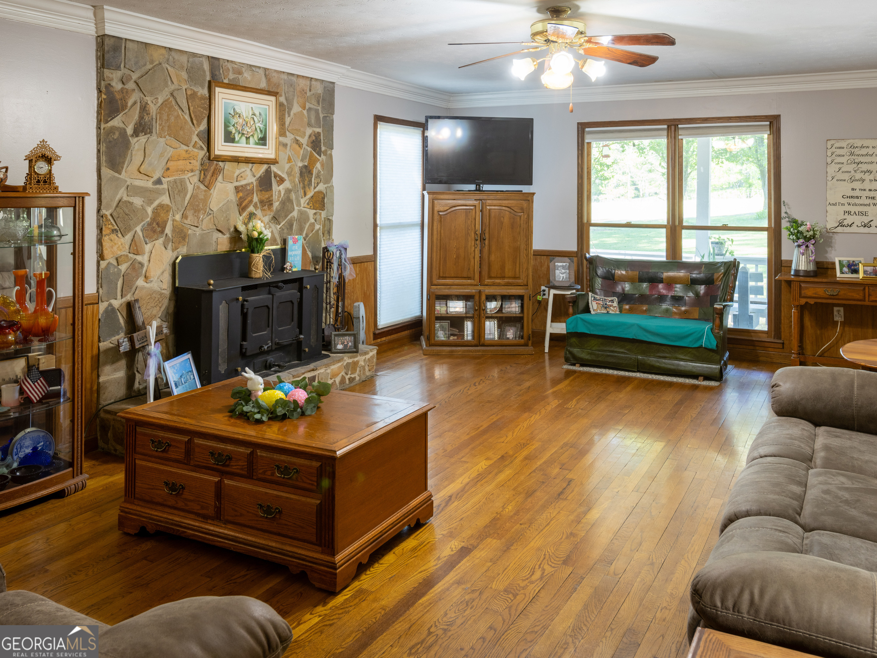 201 Little New York Road Carrollton, GA 30116 - Photo 28 of 29 a living room with furniture and a large window