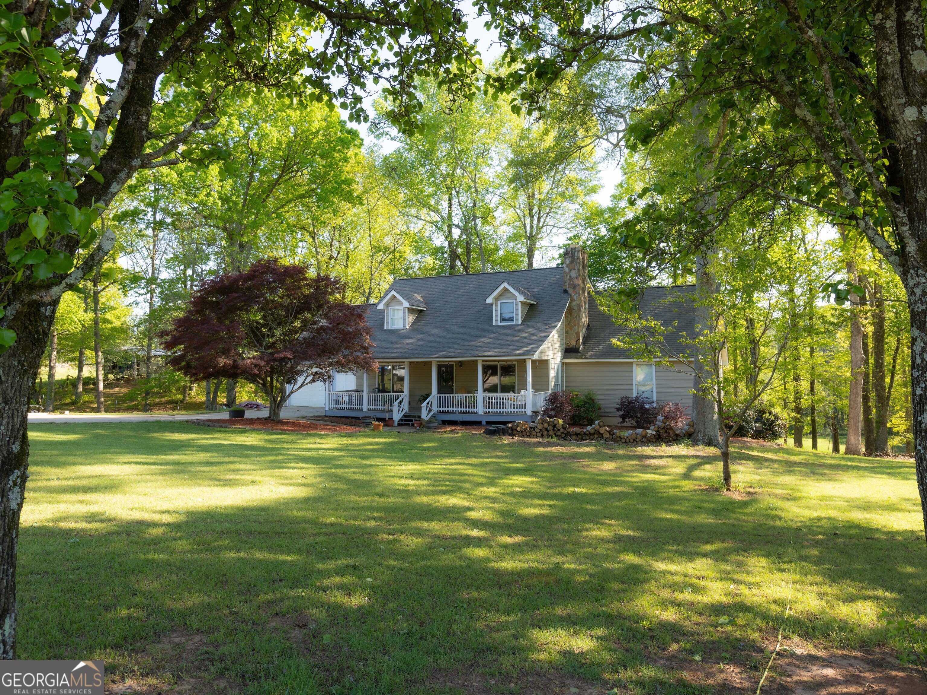 201 Little New York Road Carrollton, GA 30116 - Photo 6 of 29 a view of a house with a big yard
