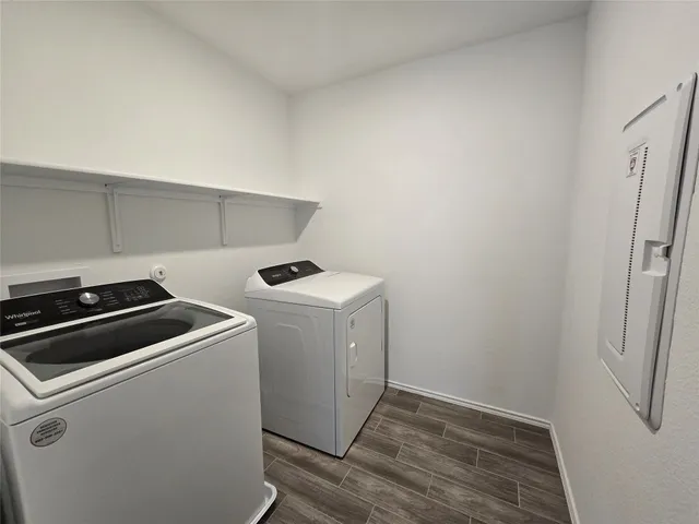 a utility room with dryer and washer