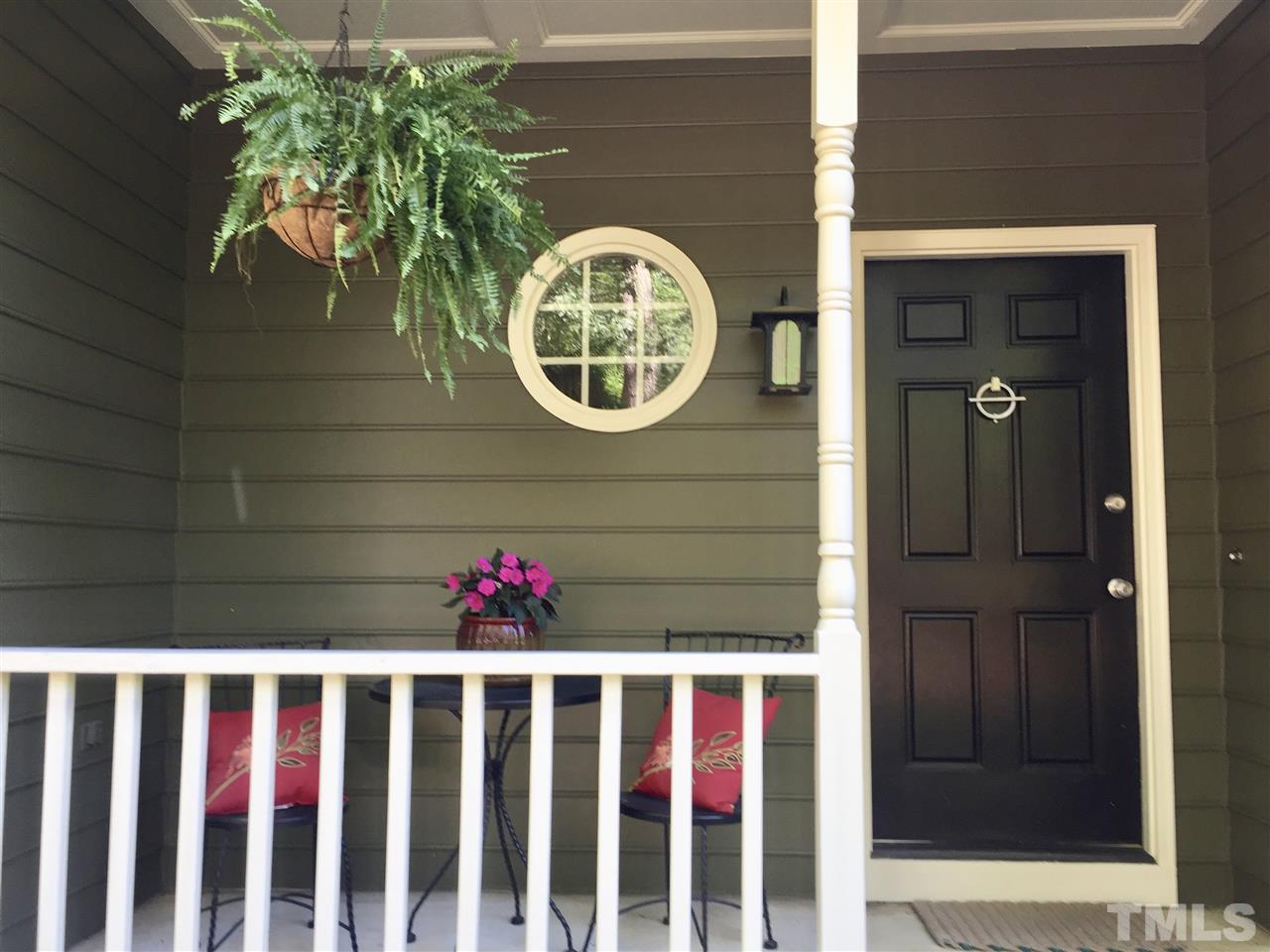 11917 Eagle Bluff Circle Raleigh, NC 27613 - Photo 2 of 25 a front view of a house with entryway