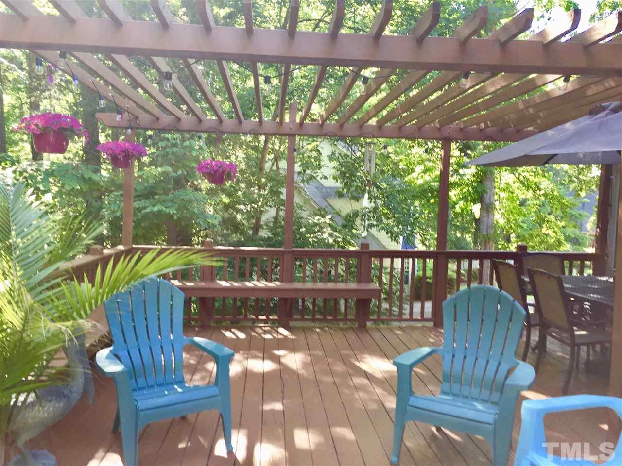 11917 Eagle Bluff Circle Raleigh, NC 27613 - Photo 20 of 25 a view of a chairs and table in the patio