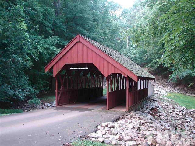 11917 Eagle Bluff Circle Raleigh, NC 27613 - Photo 25 of 25 a view of a house with a yard balcony and wooden fence
